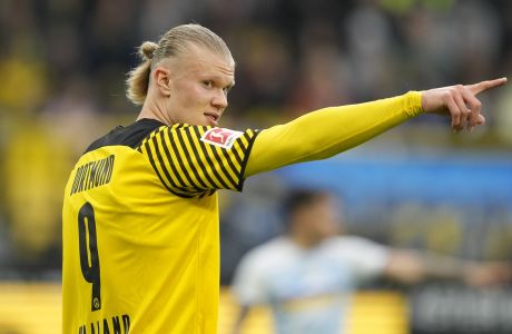 Dortmund's Erling Haaland reacts during a charity soccer match between Bundesliga team Borussia Dortmund and Dynamo Kyiv of Ukraine in the Signal Iduna Park in Dortmund, Germany, Tuesday, April 26, 2022. The match wants to show solidarity with Ukraine against Russia's war in favour of peace in Europe, the net proceeds of the match will be donated to charity. (AP Photo/Martin Meissner)