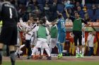 Juventus goalkeeper Gianluigi Buffon, right, celebrates with teammates at the end of the Serie A soccer match between Roma and Juventus, at the Rome Olympic stadium, Sunday, May 13, 2018. The match ended in a scoreless draw and Juventus won record-extending seventh straight Serie A title. (AP Photo/Gregorio Borgia)