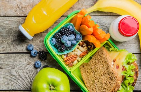 Healthy school lunch box on rustic background, copy space