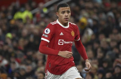 Manchester United's Mason Greenwood in action during the English Premier League soccer match between Manchester United and Burnley at Old Trafford in Manchester, England, Thursday, Dec. 30, 2021. (AP Photo/Rui Vieira)