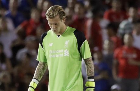 FILE - In this Wednesday, July 27, 2016 file photo, Liverpool goalkeeper Loris Karius stands on the field during the first half of the International Champions Cup soccer match against the Chelsea at the Rose Bowl in Pasadena, Calif. Liverpool has dropped goalkeeper Loris Karius for the Premier League match at Middlesbrough on Wednesday, Dec. 14, 2016 after he made mistakes in the teams last two games. Simon Mignolet, who started the season ahead of Karius before losing his place in September, regained his spot in goal. (AP Photo/Jae C. Hong, file)