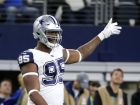 Dallas Cowboys defensive tackle David Irving (95) gestures as he stands on the field during an NFL football game against the Washington Redskins on Thursday, Nov. 30, 2017, in Arlington, Texas. (AP Photo/Michael Ainsworth)