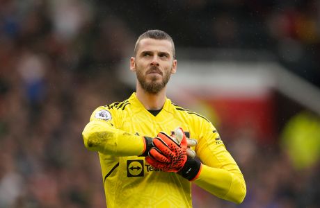 Manchester United's goalkeeper David de Gea stands on the pitch during the English Premier League soccer match between Manchester United and Aston Villa at the Old Trafford stadium in Manchester, England, Sunday, April 30, 2023. (AP Photo/Dave Thompson)