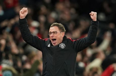 Manchester United's manager Ralf Rangnick celebrates after Marcus Rashford scored his side's first goal during the English Premier League soccer match between Manchester United and West Ham at Old Trafford stadium in Manchester, England, Saturday, Jan. 22, 2022. (AP Photo/Dave Thompson)