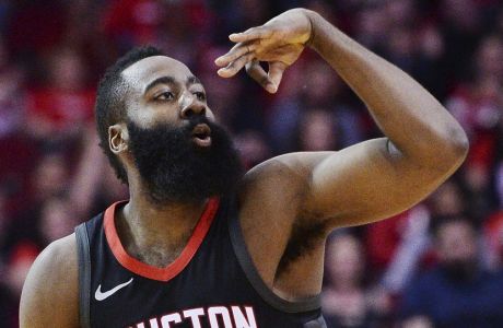Houston Rockets guard James Harden celebrates a 3-point shot against the Los Angeles Clipers early in an NBA basketball game Friday, Dec. 22, 2017, in Houston. (AP Photo/George Bridges)