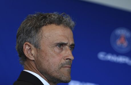 FILE - Newly named PSG coach Luis Enrique looks on during a press conference at the new Paris-Saint-Germain training ground Wednesday, July 5, 2023 in Poissy, west of Paris. (AP Photo/Aurelien Morissard, File)