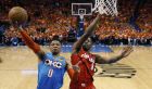 Oklahoma City Thunder guard Russell Westbrook (0) goes to the basket in front of Portland Trail Blazers forward Al-Farouq Aminu (8) during the second half of Game 3 of an NBA basketball first-round playoff series Friday, April 19, 2019, in Oklahoma City. (AP Photo/Sue Ogrocki)