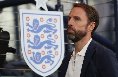 England manager Gereth Southgate looks at the field before the international friendly soccer match between Scotland and England at the Hampden Park stadium in Glasgow, Scotland, Thursday, Sept. 12, 2023. (AP PhotoScott Heppell)