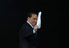 Italian former premier Silvio Berlusconi waves at the end of the Italian State RAI TV program "Che Tempo che Fa", in Milan, Italy, Sunday, Nov. 26, 2017. Hes 81 and cant run for office because of a tax fraud conviction, but three-time former Premier Silvio Berlusconi is once again playing king-maker on the Italian political scene. (AP Photo/Antonio Calanni)