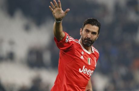 FILE - In this Wednesday, Nov. 22, 2017 filer, Juventus goalkeeper Gianluigi Buffon waves to fans at the end of the Champions League group D soccer match between Juventus and Barcelona, at the Allianz Stadium in Turin, Italy. Juventus captain Gianluigi Buffon has announced he is leaving the Italian club but the goalkeeper could continue playing elsewhere. Buffon, who is widely regarded as one of the best goalkeepers of all time, was expected to announce his retirement at a press conference at Allianz Stadium on Thursday, May 17, 2018. (AP Photo/Antonio Calanni, File)