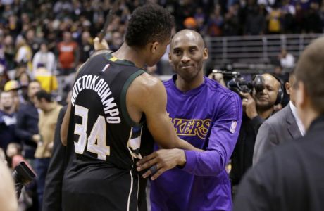 MILWAUKEE, WI - FEBRUARY 22: Kobe Bryant #24 of the Los Angeles Lakers hugs Giannis Antetokounmpo #34 of the Milwaukee Bucks after the game against the Milwaukee Bucks at BMO Harris Bradley Center on February 22, 2016 in Milwaukee, Wisconsin. NOTE TO USER: User expressly acknowledges and agrees that, by downloading and or using this photograph, User is consenting to the terms and conditions of the Getty Images License Agreement. (Photo by Mike McGinnis/Getty Images)