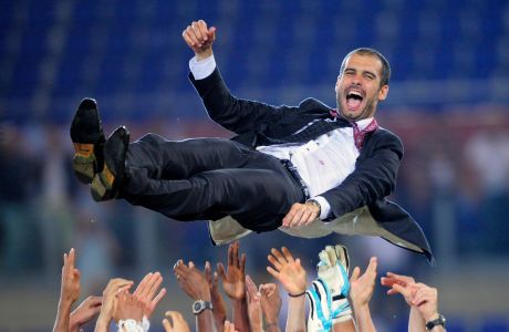 FILE - In this Wednesday May 27, 2009 file photo Barcelona coach Pep Guardiola is thrown in the air in celebration, at the end of the UEFA Champions League final soccer match between Manchester United and Barcelona in Rome. Pep Guardiola will not continue as Barcelona's coach after this season, according to Spanish news reports. Guardiola, whose contract expires at the end of the season, is scheduled to announce his decision on Friday in a news conference at 1330 local time (1130 GMT) with club president Sandro Rosell and sports director Andoni Zubizarreta. (AP Photo/Manu Fernandez, File)