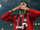 Bayer Leverkusen's Dimitar Berbatov, of Bulgaria, celebrates after scoring during the UEFA Cup Champions league soccer match between AS Roma and Bayer Leverkusen at Rome's Olympic stadium, Wednesday, Nov. 3, 2004. The match ended 1-1. (AP Photo/Plinio Lepri)