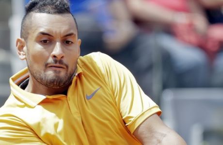 Nick Kyrgios of Australia returns the ball to Daniil Medvedev of Russia at the Italian Open tennis tournament, in Rome, Tuesday, May, 14, 2019. Kyrgios won 6-3, 3-6, 6-3. (AP Photo/Andrew Medichini)