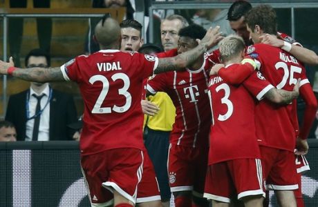 Bayern's players celebrate the third goal of their team during the Champions League, round of 16, second leg, soccer match between Besiktas and Bayern Munich at Vodafone Arena stadium in Istanbul, Wednesday, March 14, 2018. Bayern won 3-1. (AP Photo/Lefteris Pitarakis)