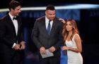 Co-host and US actress Eva Longoria speaks on stage next to co-host Marco Schreyl (L) and former Brazilian football player Ronaldo to announce the winner of The 2016 FIFA Puskas Award during The Best FIFA Football Awards ceremony, on January 9, 2017 in Zurich. / AFP PHOTO / Fabrice COFFRINI
