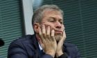 FILE - Chelsea soccer club owner Roman Abramovich sits in his box before their English Premier League soccer match against Sunderland at Stamford Bridge stadium in London, Dec. 19, 2015. The Football Association says Chelsea has withdrawn its request to play its FA Cup game against Middlesbrough without a crowd, a proposal that had sparked fierce opposition from the second-tier club hosting the match. The Premier League team had proposed no fans because the government wont allow Chelsea to sell any tickets under the terms of its license to operate after owner Roman Abramovich was sanctioned. (AP Photo/Matt Dunham, File)