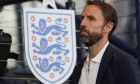England manager Gereth Southgate looks at the field before the international friendly soccer match between Scotland and England at the Hampden Park stadium in Glasgow, Scotland, Thursday, Sept. 12, 2023. (AP PhotoScott Heppell)