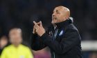 Napoli's head coach Luciano Spalletti gives instructions from the side line during a Champions League quarterfinal second leg soccer match between Napoli and AC Milan, at Naples' Diego Armando Maradona stadium, Tuesday, April 18, 2023. (AP Photo/Andrew Medichini)