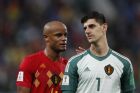 Belgium's Vincent Kompany, left, and Belgium goalkeeper Thibaut Courtois leave the field after the semifinal match between France and Belgium at the 2018 soccer World Cup in the St. Petersburg Stadium in, St. Petersburg, Russia, Tuesday, July 10, 2018. (AP Photo/Frank Augstein)