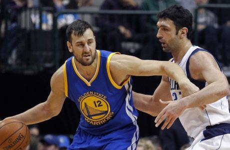 Dec. 30, 2015 - Dallas, TX, USA - The Golden State Warriors' Andrew Bogut (12) tries to move around the Dallas Mavericks' Zaza Pachulia in the first quarter at the American Airlines Center in Dallas on Wednesday, Dec. 30, 2015. The Mavs won, 114-91 (Photo by Paul Moseley/Zuma Press/Icon Sportswire) 