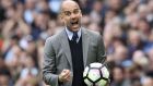 Manchester City manager Pep Guardiola gestures on the touchline, during the English Premier League soccer match between Manchester City and Leicester, at the Etihad Stadium, in Manchester, England, Saturday May 13, 2017. (Martin Rickett/PA via AP)