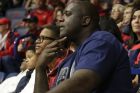 Shaquille O'Neal and son Shareef watch game action between Arizona and Sacred Heart during the first half of an NCAA college basketball game, Friday, Nov. 18, 2016, in Tucson, Ariz. (AP Photo/Rick Scuteri)                    