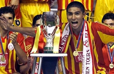 Brazilian soccer player Mario Jardel, right, of Galatasaray, celebrates their 2-1 victory over Real Madrid in the UEFA Super Cup at the  Louis II stadium in Monaco Friday Aug.25, 2000.(AP Photo/Michel Euler)
