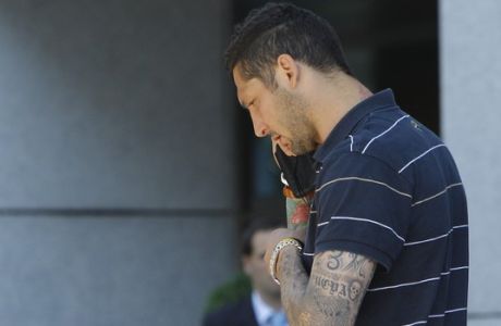 Inter Milan's Marco Materazzi leaves a hotel in Madrid on Thursday, May 20, 2010. The Champions league final soccer match between Inter Milan and Bayern Munich is scheduled for Saturday, May 22 in Madrid.  (AP Photo/Arturo Rodriguez)