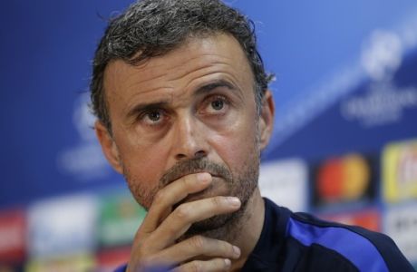 FC Barcelona's coach Luis Enrique gestures during a press conference at the Sports Center FC Barcelona Joan Gamper in Sant Joan Despi, Spain, Tuesday, April 18, 2017. FC Barcelona will play against Juventus in a Champions League quarterfinal, second-leg soccer match on Wednesday. (AP Photo/Manu Fernandez)