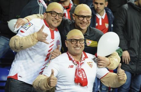 Sevilla fans pose for a picture ahead of the Champions League round of 16 second leg soccer match between Leicester City and Sevilla at the King Power Stadium in Leicester, England, Tuesday, March 14, 2017. (AP Photo/Rui Vieira)