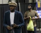 Houston Rockets forward Luc Mbah a Moute, left, and center Nene Hilario arrive before Game 4 of the NBA basketball Western Conference Finals between the Golden State Warriors and the Rockets in Oakland, Calif., Tuesday, May 22, 2018. (AP Photo/Marcio Jose Sanchez)