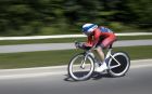 United States' Kelly Catlin pedals during the women's individual time trial cycling competition at the Pan Am Games in Milton, Ontario, Wednesday, July 22, 2015. Catlin won the gold medal in the event. (AP Photo/Felipe Dana)