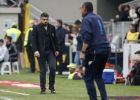 AC Milan coach Gennaro Gattuso, left, walks the pitch during the Serie A soccer match between AC Milan and Napoli at the San Siro stadium in Milan, Italy, Sunday, April 15, 2018. (AP Photo/Antonio Calanni)