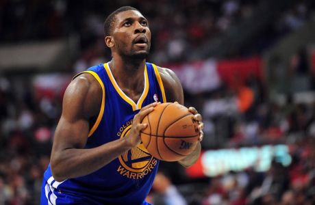 November 3, 2012; Los Angeles, CA, USA; Golden State Warriors center Festus Ezeli (31) shoots a free throw against the Los Angeles Clippers during the first half at Staples Center. Mandatory Credit: Gary A. Vasquez-USA TODAY Sports
