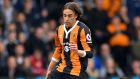 Hull City's Lazar Markovic, left, vies for the ball with Sunderland's Jason Denaye, during the English Premier League soccer match between Hull City and Sunderland, at the KCOM Stadium, in Hull, England, Saturday May 6, 2017. (Dave Howarth/PA via AP)