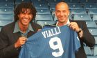 Chelsea's Italian International Gianluca Vialli, right, with his new team manager Ruud Gullit at Chelsea's Soccer stadium Stamford Bridge London, Monday June 17, 1996. Vialli has signed for the English club from Juventus, he will make his debut playingfor Chelsea in the English Premier League against Southampton in August.  Vialli is holding his new team shirt .(AP Photo/Alastair Grant)