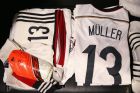 RIO DE JANEIRO, BRAZIL - JULY 13:  The shirts worn by Thomas Mueller of Germany are displayed in the dressing room prior to the 2014 FIFA World Cup Brazil Final match between Germany and Argentina at Maracana on July 13, 2014 in Rio de Janeiro, Brazil.  (Photo by Alex Livesey - FIFA/FIFA via Getty Images)