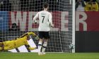 Germany's Kai Havertz fails to score a penalty shot by hitting the post during the international friendly soccer match between Germany and Peru at the Opel Arena in Mainz, Germany, Saturday, March 25, 2023. (AP Photo/Michael Probst)