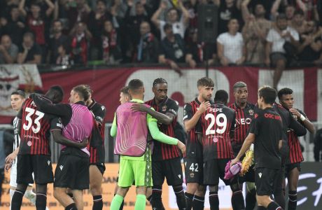 Nice players celebrate their victory in the Conference League Group D soccer match between Nice and Partizan at Allianz Riviera stadium in Nice, France, Thursday, Oct. 27, 2022. (AP Photo/Daniel Cole)