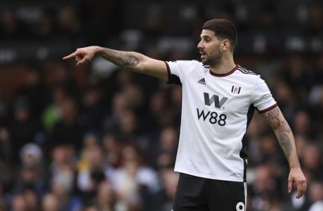 Fulham's Aleksandar Mitrovic reacts during the English Premier League soccer match between Fulham and Arsenal at Craven Cottage stadium in London, Sunday, March 12, 2023. (AP Photo/Ian Walton)
