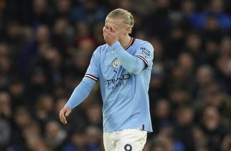 Manchester City's Erling Haaland celebrates after scoring the opening goal during the English Premier League soccer match between Manchester City and Everton at the Etihad Stadium in Manchester, England, Saturday, Dec. 31, 2022. (AP Photo/Dave Thompson)