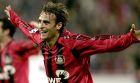 LEVERKUSEN, GERMANY:  Bayer Leverkusen's Dimitar Berbatov (Bulagaria) celebrates after scoring against Real Madrid during their Champions League preliminary football match in Leverkusen 15 September 2004.  Berbatov scored to bring the score to 3 - 0. AFP PHOTO JOCHEN LUEBKE     GERMANY OUT  (Photo credit should read JOCHEN LUEBKE/AFP/Getty Images)