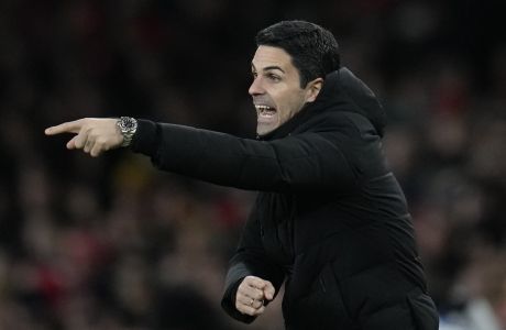 Arsenal's manager Mikel Arteta gestures during the English Premier League soccer match between Arsenal and Everton at the Emirates stadium in London, Wednesday, March 1, 2023. (AP Photo/Kirsty Wigglesworth)
