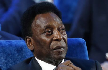 FILE - Brazilian Pele attends the 2018 soccer World Cup draw at the Kremlin in Moscow, Dec. 1, 2017. Pele was hospitalized once more in Sao Paulo to continue his colon tumor treatment. Hospital Albert Einstein said in a statement on Wednesday, Dec. 8, 2021, that the 81-year-old soccer legend is stable and expected to be released in the next few days. (AP Photo/Alexander Zemlianichenko, File)