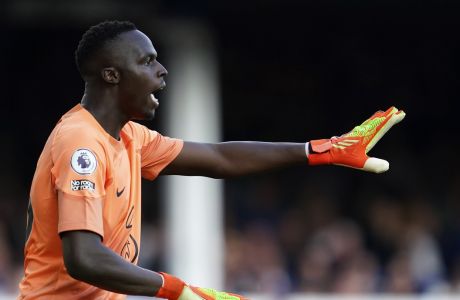 Chelsea's goalkeeper Edouard Mendy reacts during the English Premier League soccer match between Everton and Chelsea at Goodison Park in Liverpool, England, Saturday, Aug. 6, 2022. (AP Photo/Jon Super)