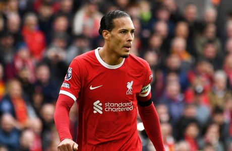 Liverpool's Virgil van Dijk during the English Premier League soccer match between Liverpool and Brighton & Hove Albion at Anfield, in Liverpool, England, Sunday March 31, 2024. (AP Photo/Rui Vieira)