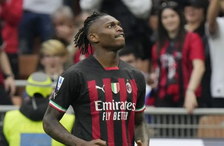 AC Milan's Rafael Leao celebrates after scoring his side's second goal during a Serie A soccer match between AC Milan and Lecce, at the San Siro stadium in Milan, Italy, Sunday, April 23, 2023. (AP Photo/Luca Bruno)