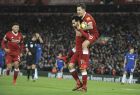 Liverpool's Mohamed Salah, left, celebrates with Liverpool's Philippe Coutinho after scoring during the English Premier League soccer match between Liverpool and Chelsea at Anfield, Liverpool, England, Saturday, Nov. 25, 2017. (AP Photo/Rui Vieira)
