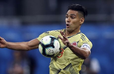 FILE - In this Sunday, June 23, 2019 file photo, Colombia's Radamel Falcao Garcia controls the ball during a Copa America Group B soccer match against Paraguay at the Arena Fonte Nova in Salvador, Brazil. Colombia striker Radamel Falcao has returned to the Spanish league with modest club Rayo Vallecano. Rayo announced the signing on Saturday Sept. 4, 2021, but did not immediately release details on the length of the contract. (AP Photo/Ricardo Mazalan, File)